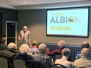 Mayor Dave Atchison presents a report of accomplishments and goals for the City of Albion to a group of about 125 people at the Courtyard by Marriott hotel on Thursday, March 5.